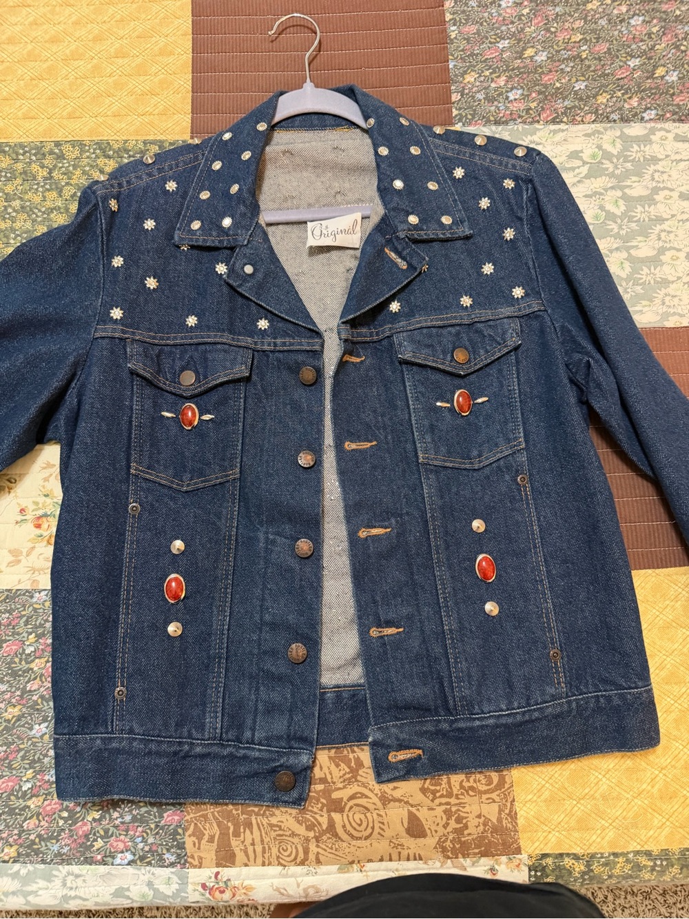 Vintage-Inspired Dark Blue Denim Jacket with Red Stone Accents